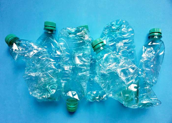 Plastic of empty bottles of water placed one next to the other.