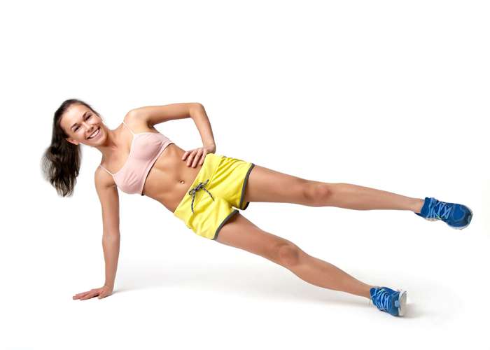 Regular exercise helps for weight loss" woman with beautiful body exercising