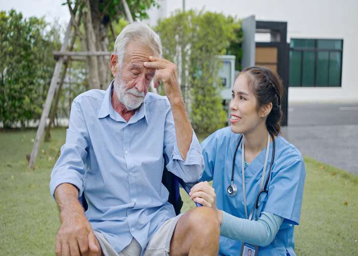 Manage stress for Parkinson: senior man stressed.