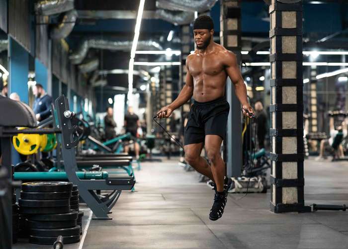 Physical activity is important to improve erectile dysfunction: man training at the gym