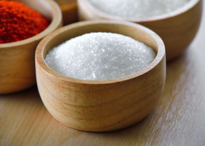 Avoid food additives for ADHD: Monosodium glutamate (MSG) food additive in a cup.