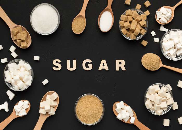 Avoid sugar for ADHD: selection of sugar including brown sugar, powder sugar, and sugar cubes.