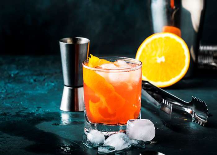 Avoid alcohol for Parkinson disease: orange alcohol drink.