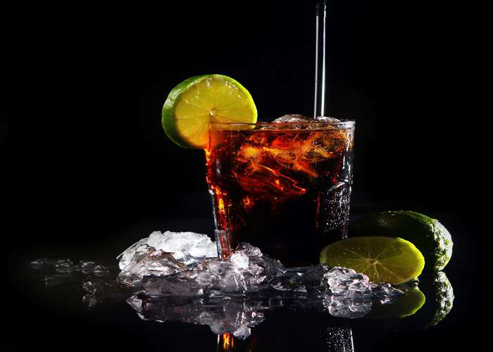 Avoid gas causing foods for IBS: cola drink with lime and ice.
