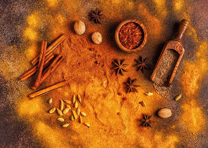 Avoid spicy foods for hemorrhoids: display of different kinds of spices.